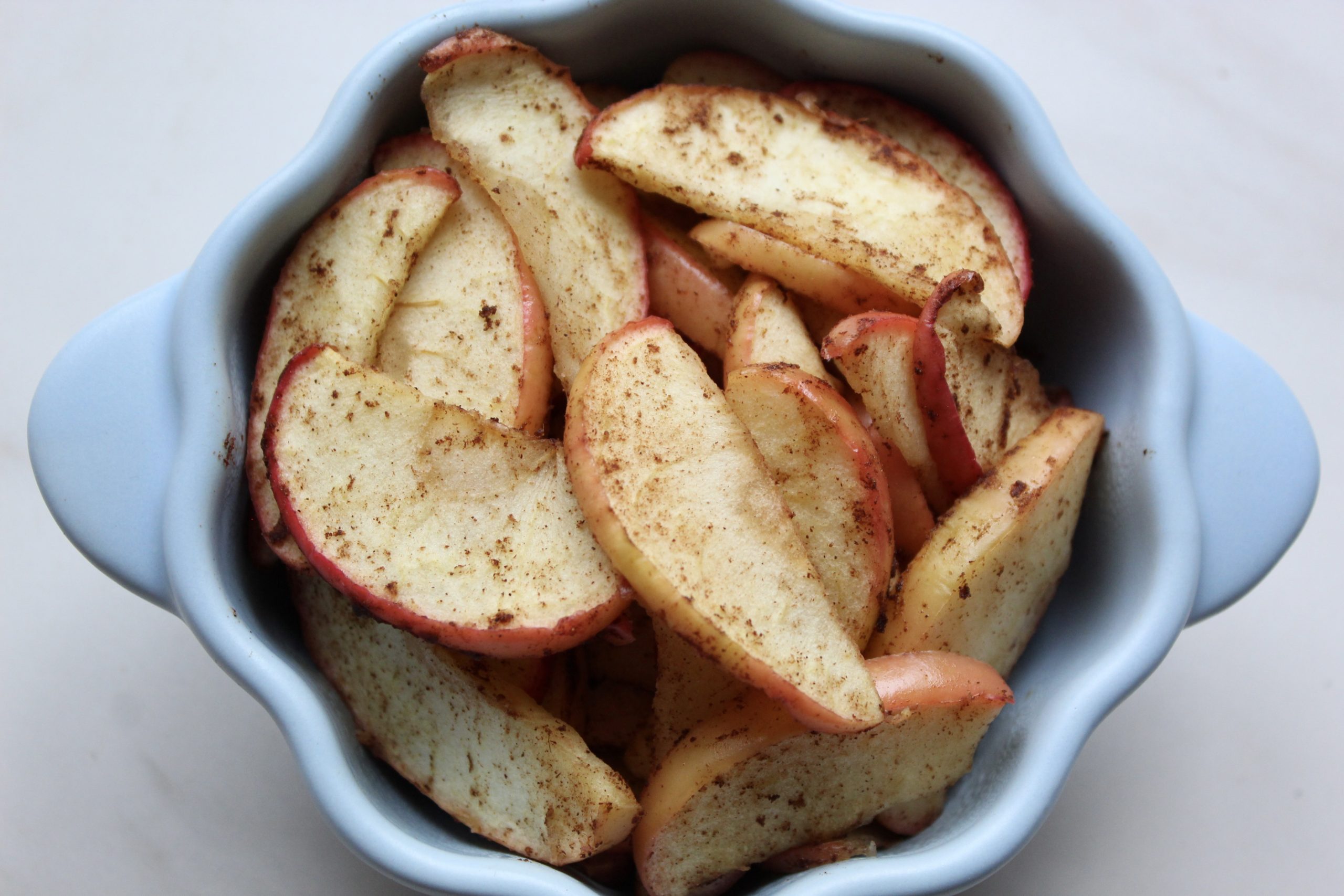 https://nomeatfastfeet.com/wp-content/uploads/2022/09/Baked-Cinnamon-Sugar-Apple-Slices-scaled.jpg